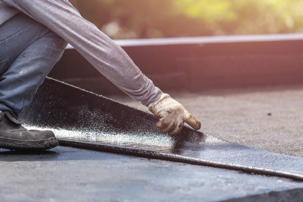 Professional Exterior Waterproofing technician working in Avon, NY